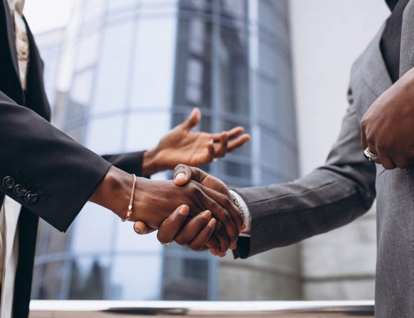 African business male people shaking hands